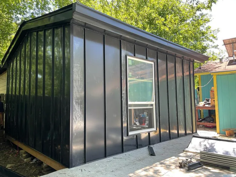 Black standing seam metal wall panels for Roof Inspection in Cimarron Hills