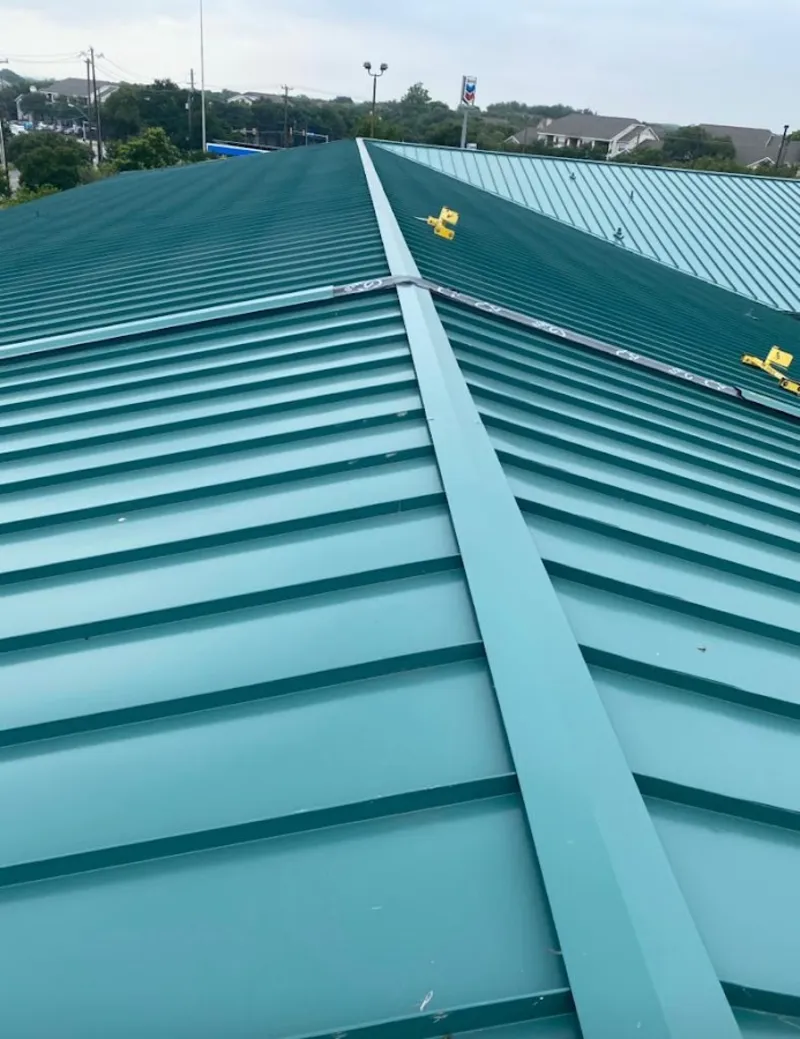 Green commercial metal roof ridge and valley for Metal Roof Repair in Cimarron Hills